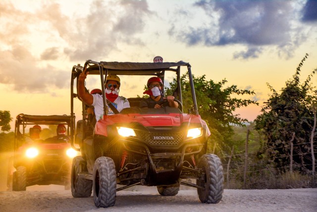 Visit Punta Cana Sunset Buggy Tour With Cave Swim and Dance Show in La Romana