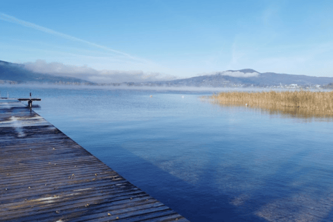 Fuschlsee: Stand-Up Paddleboard e chá guiados no invernoFuschlsee: stand-up paddle de inverno guiado e chá