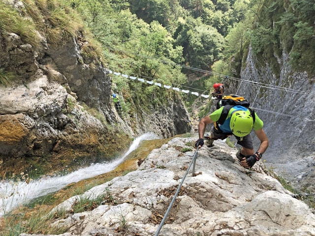 Visit Ballino Rio Ruzza Via Ferrata Trip with Mountain Guide in Madonna di Campiglio