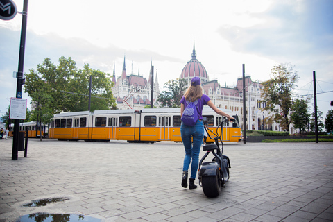 Top sights of Pest downtown on e-scooters incl. ParliamentBudapest: E-Scooter Tour of Downtown Pest with A Local Guide