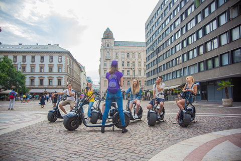 Top sights of Pest downtown on e-scooters incl. Parliament