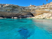 Siracusa, gita in barca con pranzo, vino e fermate di nuoto - Hizvo