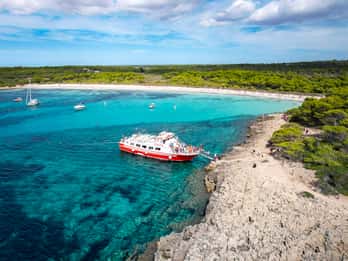 Menorca: Full-Day Boat Tour with Paella Lunch