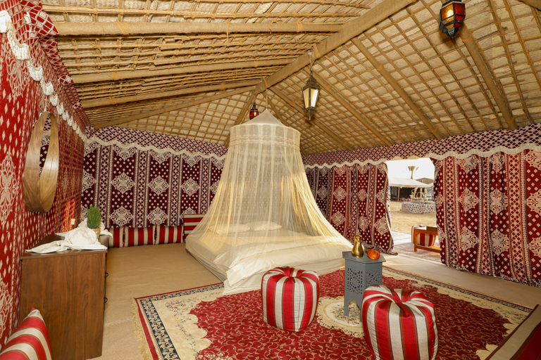 From Dubai: Red Dunes and Camel Safari with Overnight Camp Shared Tour with Private Tent