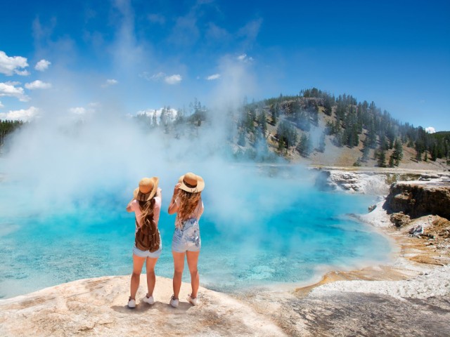 Visit Yellowstone Old Faithful, Waterfalls, and Wildlife Day Tour in Yellowstone National Park, Wyoming, USA