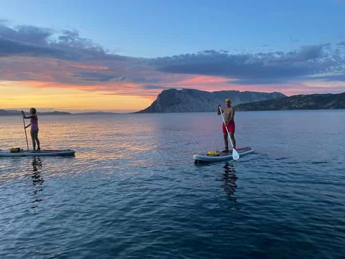 Sardinia SUP paddleboard tour sunset lesson-offered aperitif | GetYourGuide