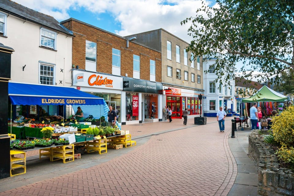 A wet shopping day at Bicester Village, Oxfordshire, UK Stock