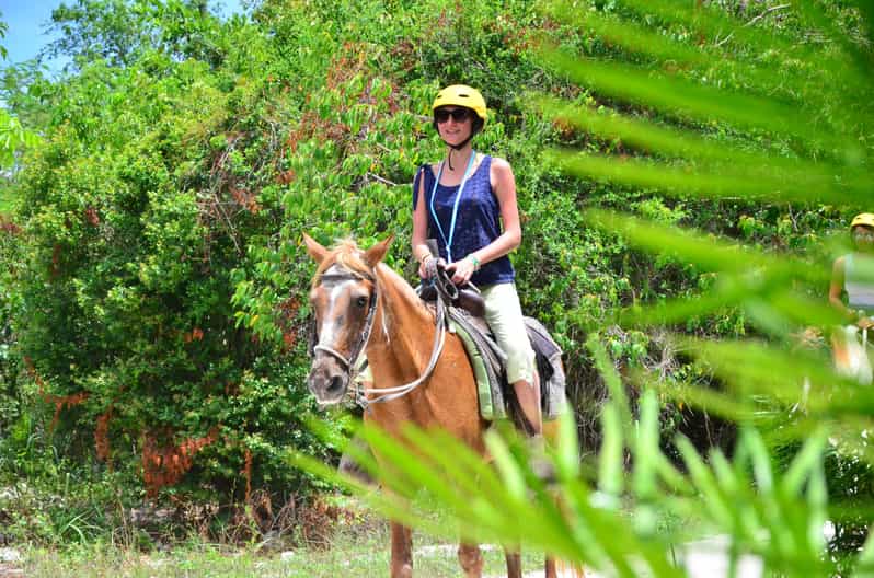 Punta Cana Ziplining, Horseback Riding, and Waterfall Pool GetYourGuide