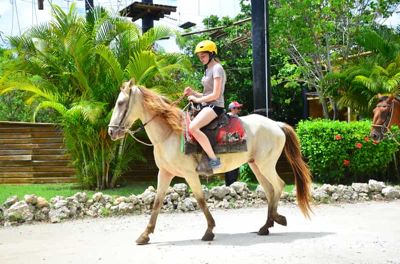 Punta Cana Ziplining, Horseback Riding, and Waterfall Pool GetYourGuide