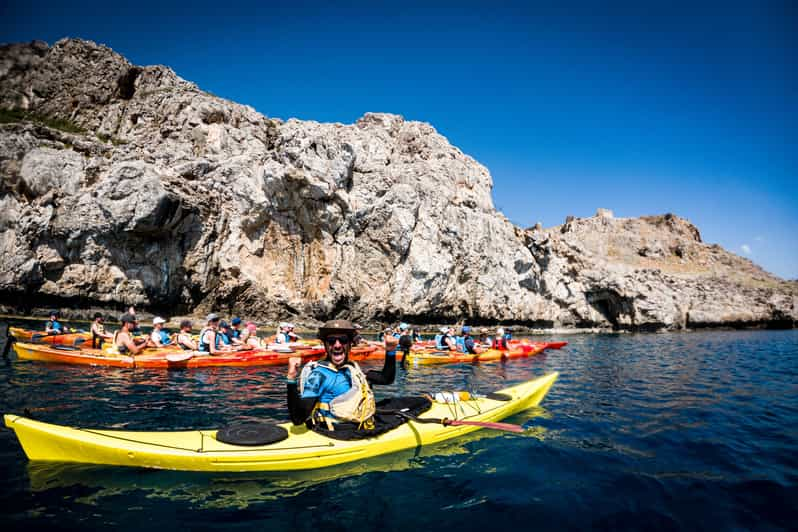 Rhodes: Sea Kayak Adventure to the Red Sand Beach | GetYourGuide