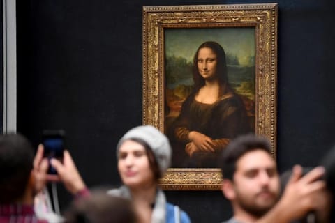 Paris: Louvre Timed Entry and Seine Cruise