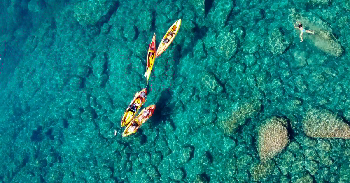 Barcelona Costa Brava Kayak, Snorkel & Cliff Jump w/ Lunch GetYourGuide