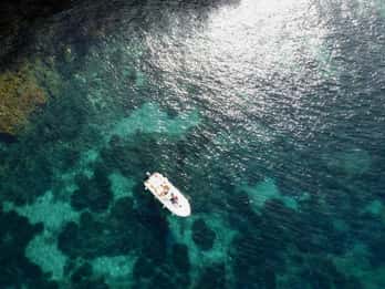 Procida: tour in barca con soste per nuotare e foto subacquee