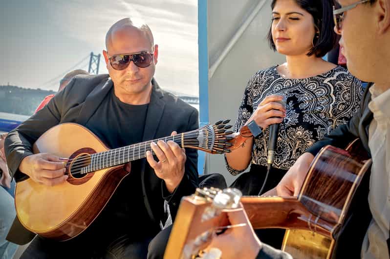 Lisbon Boat Cruise with Live Fado Performance and a Drink GetYourGuide