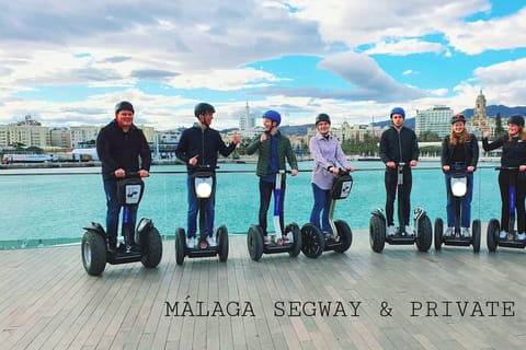 Malaga: Park, Port and Castle Gibralfaro Segway/Scooter Tour