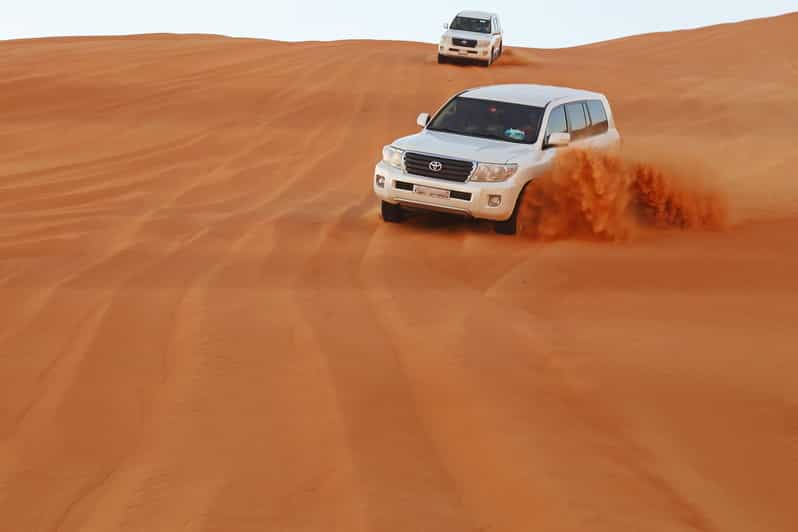 Dubai Desert Tour: Morning & Evening Dune Bashing Adventure | GetYourGuide