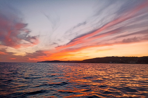 Malta: Passeio de barco privado ao pôr do sol para Comino e Lagoa Azul