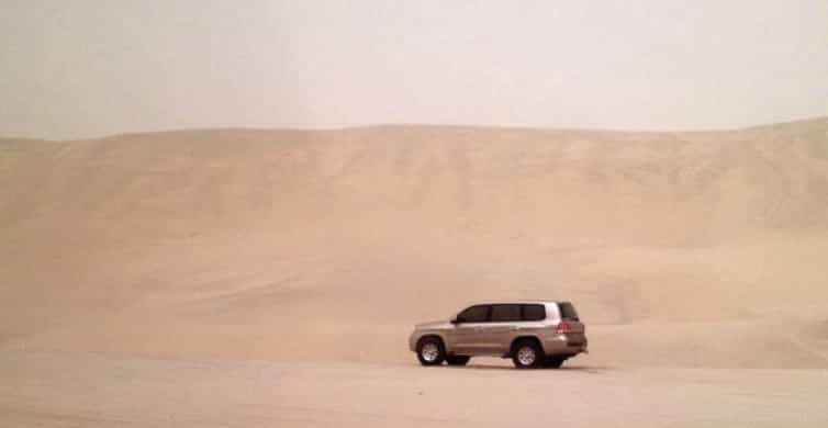 Doha Desert Safari: Sandboarding, Camel Ride & Swimming Fun photo 4