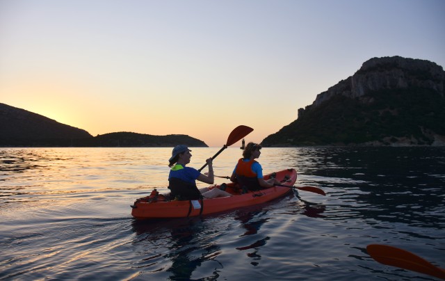 Visit Golfo Aranci: Sunrise Dolphin Kayak Tour with Breakfast in San Teodoro, Italy
