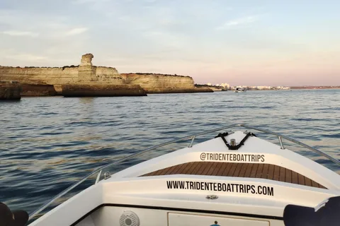 From Armação de Pêra: Sunset Benagil Caves Boat Tour