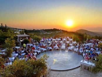 Kos: Tavern Dinner Experience with Greek Dancing and Wine
