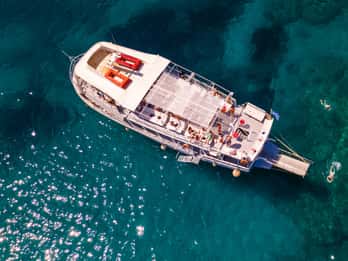 Rhodes: Bay to Bay Swim Cruise with Greek Buffet and Wine