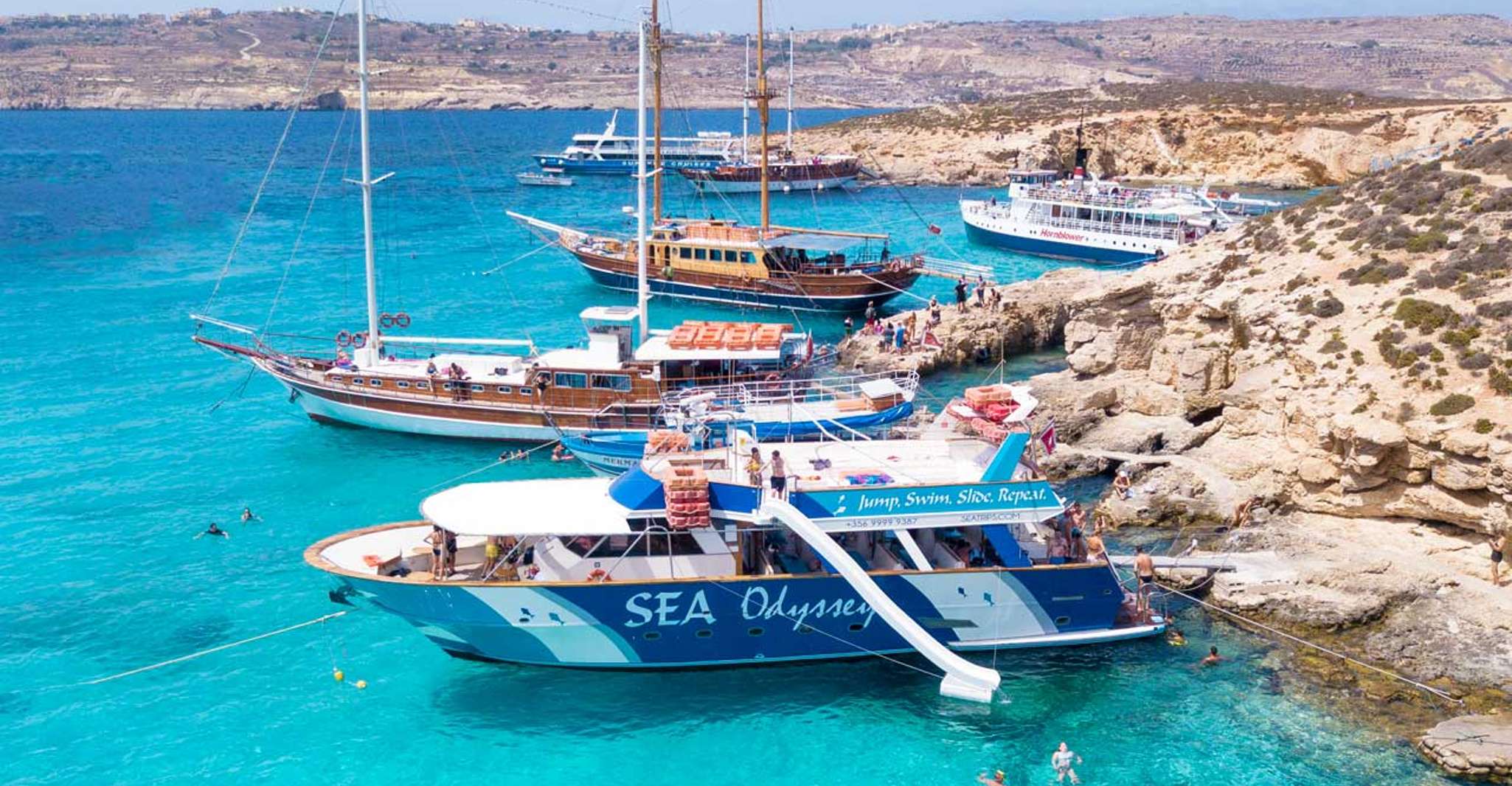 Comino, Blue Lagoon, Crystal Lagoon, and Seacaves Tour - Housity