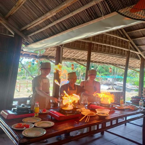 Visit Hoi An Sunset Cooking Class with Market & Basket Boat Tour in Danang