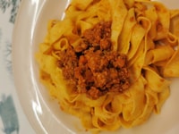 Bologna, cours de cuisine traditionnelle avec des vins locaux - Hizvo