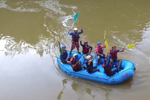From Medellín: Paragliding and Rafting Combo Tour