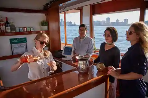 NYC: Sunset Cruise on a Small Yacht with a Drink