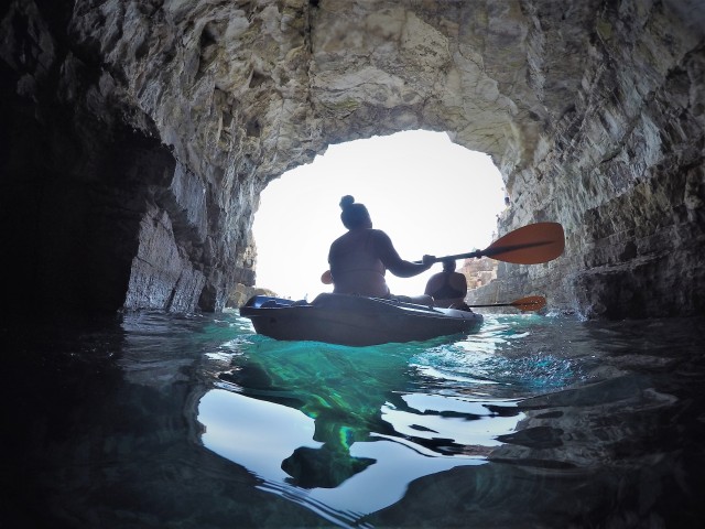 Visit Pula Blue Cave Kayak Tour, Snorkeling and Cliff Jumping in Pula