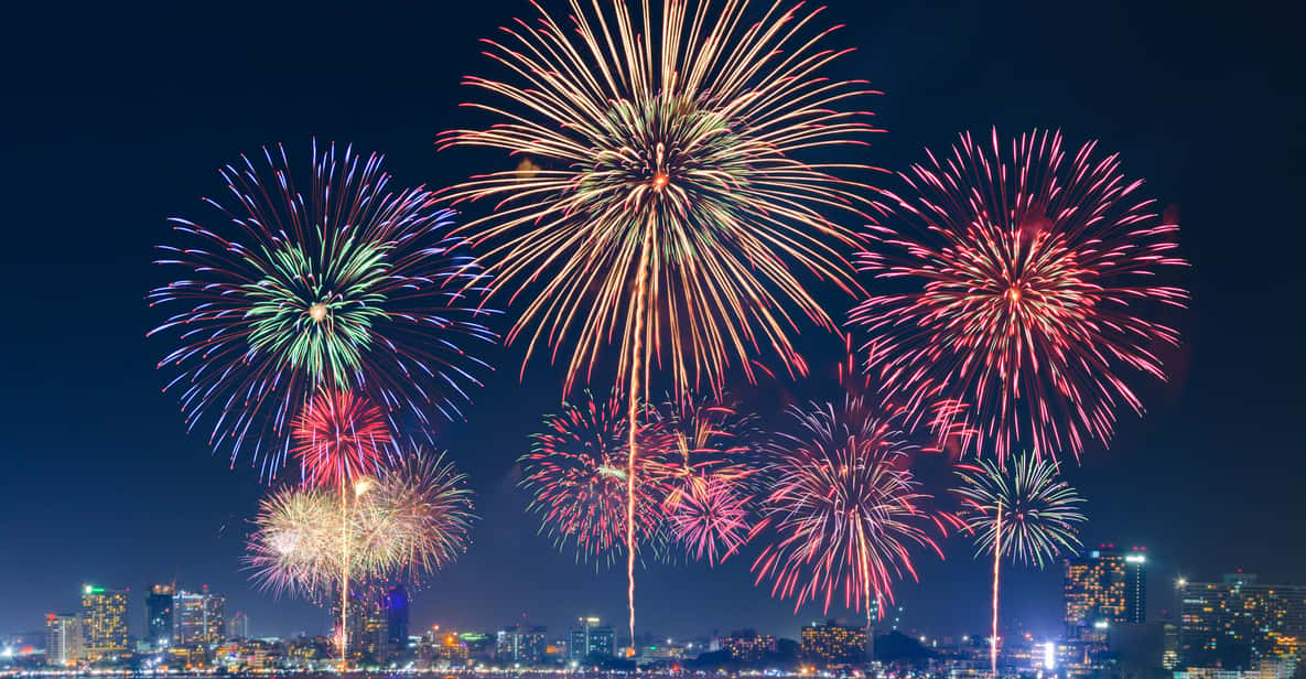 From Honolulu New Year's Eve Fireworks Cruise with Drinks GetYourGuide