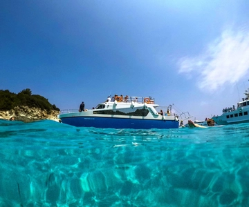 From Lefkimmi: Syvota, Blue Lagoon and Cave Sunset Cruise
