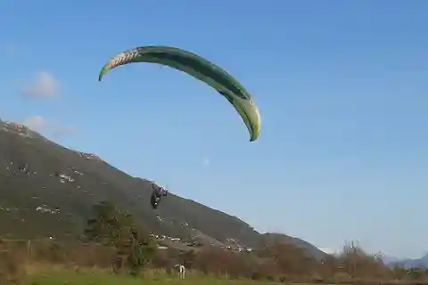 Tandem paragliding above ionian sea syvota