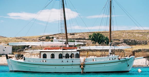 Corfu Town: Full-Day Cruise with Lunch, Drinks & Swim Stops