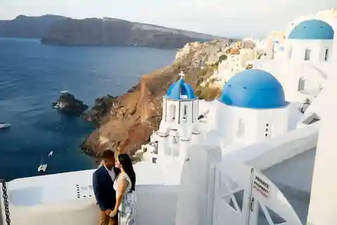 Santorini: Sesión de fotos con un fotógrafo de vacaciones en Oia