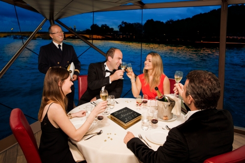 París: Crucero turístico por el Sena con cena de 4 platosMenú Excelencia (incluye champán)
