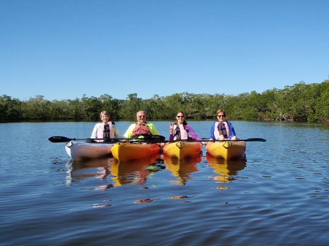 Visit Fort Myers Guided Sunset Kayaking Tour through Pelican Bay in Bonita Springs, Florida