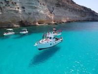 Taormina, Boat Tour with Aperitif on Isola Bella - Housity