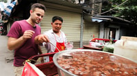 Tour gastronomico serale di Chengdu con guida locale - Hizvo
