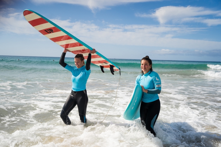 Learn to surf on the white beaches in Fuerteventura's south