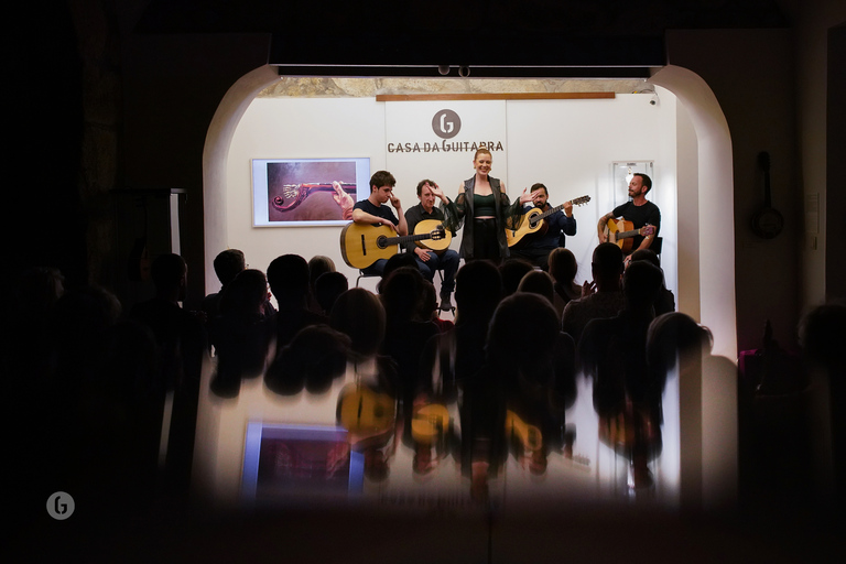 Porto: Fado Concert with Port Wine in Historical Music Store