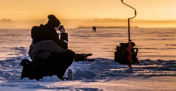 Levi: Ice Fishing on a Frozen Lake with BBQ and Photos