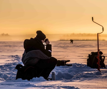 Levi: Ice Fishing on a Frozen Lake