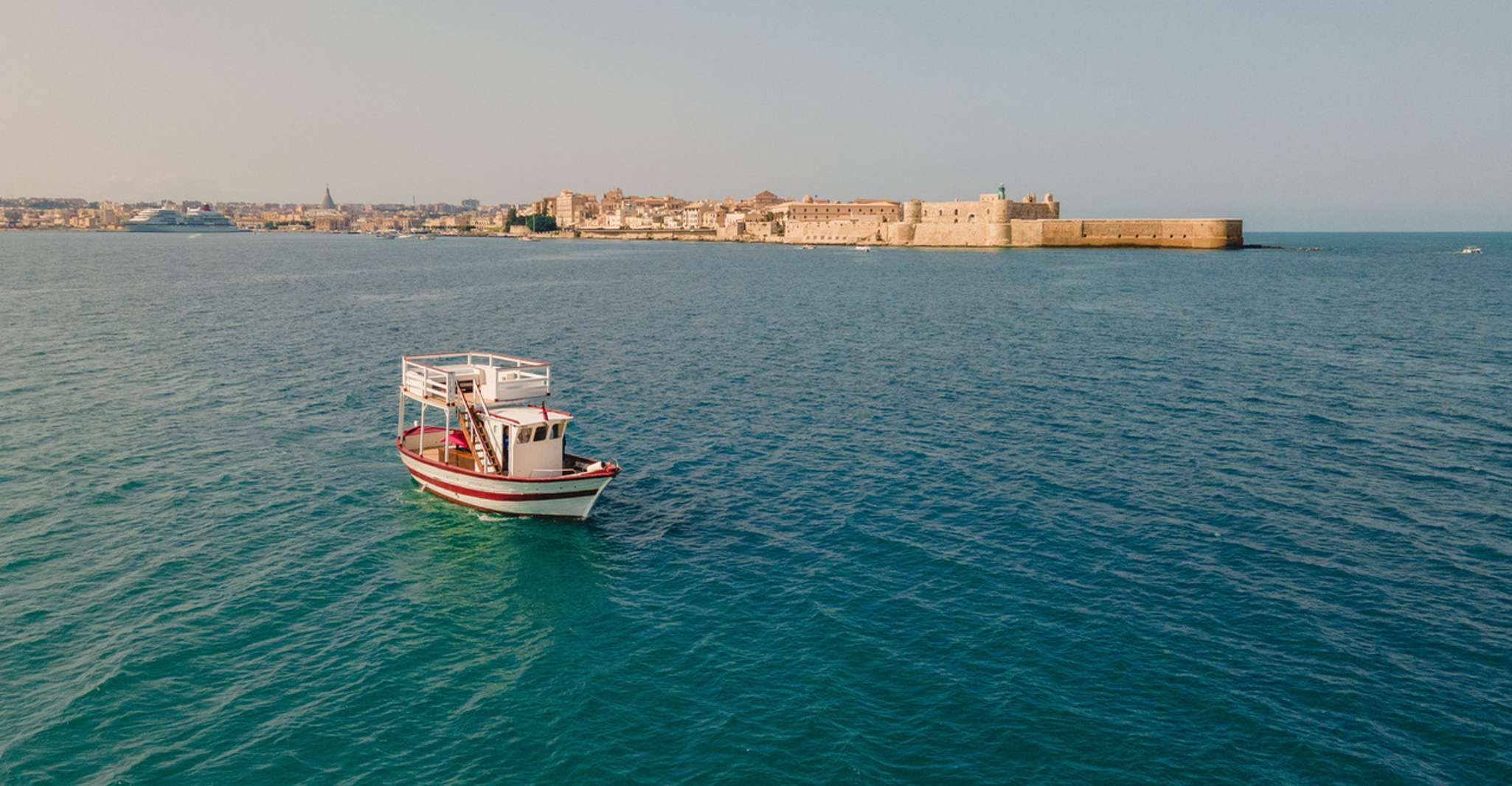 Syracuse, Sunset cruise including aperitif and swim stop - Hizvo