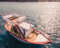 Siracusa, gita in barca con pranzo, vino e fermate di nuoto - Hizvo