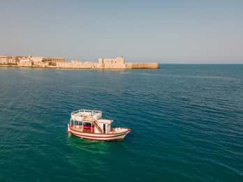 Syracuse: Boat Trip with Lunch, Wine, and Swimming Stops