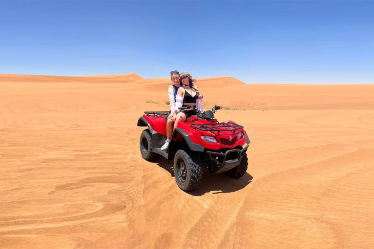 Depuis Dubaï : matinée safari dans le désert en quadTransfert privé, 1 heure de quad uniquement (sans camp)