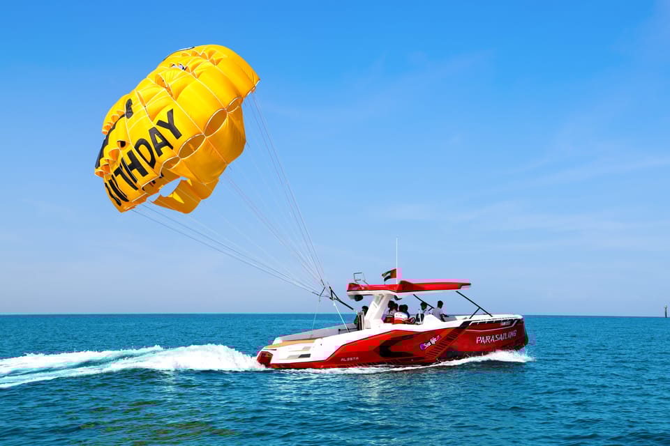 Dubai Parasailing with Happy birthday Parachute JBR & Palm GetYourGuide